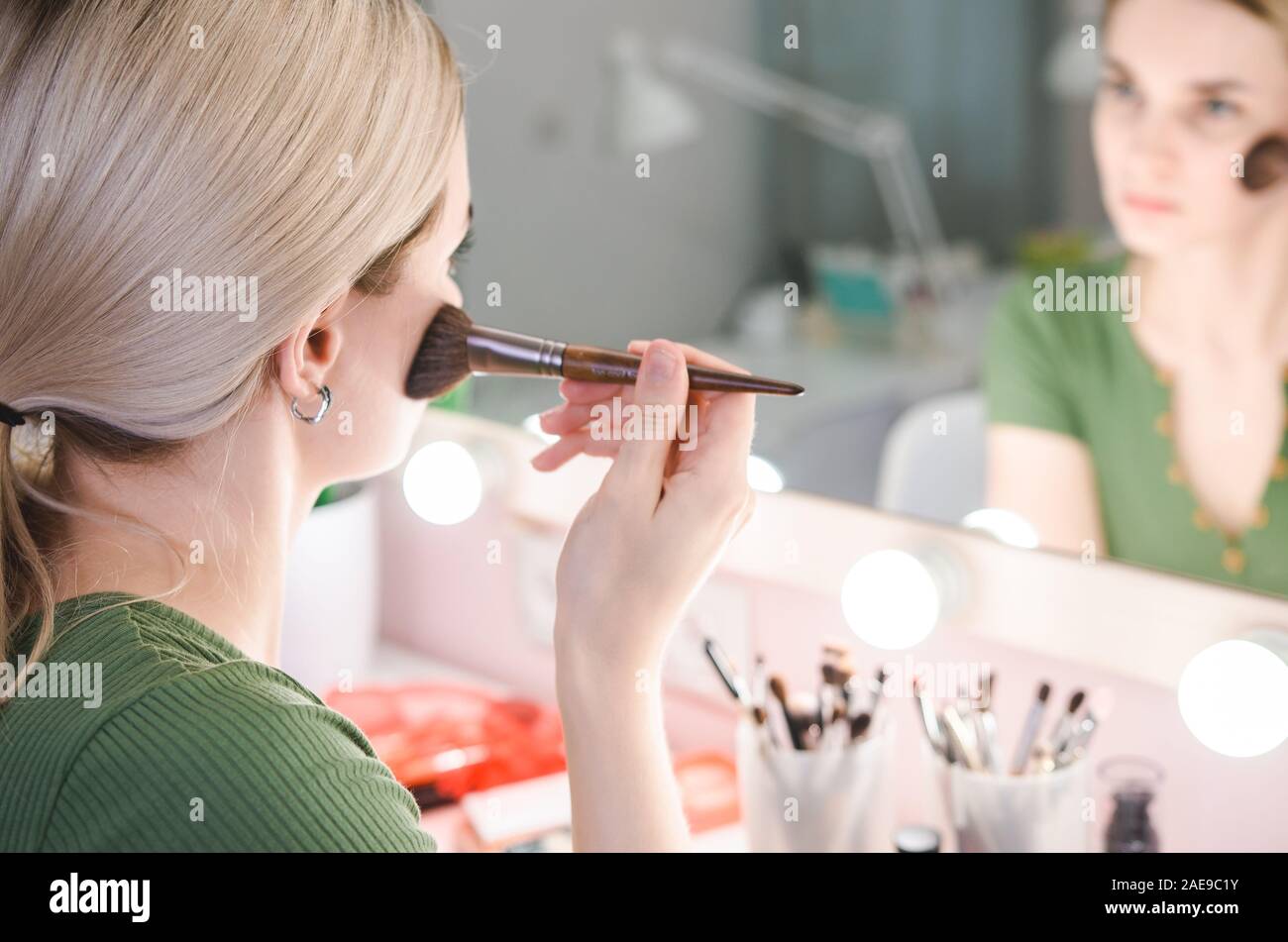 Applying makeup compact mirror hi-res stock photography and images - Alamy