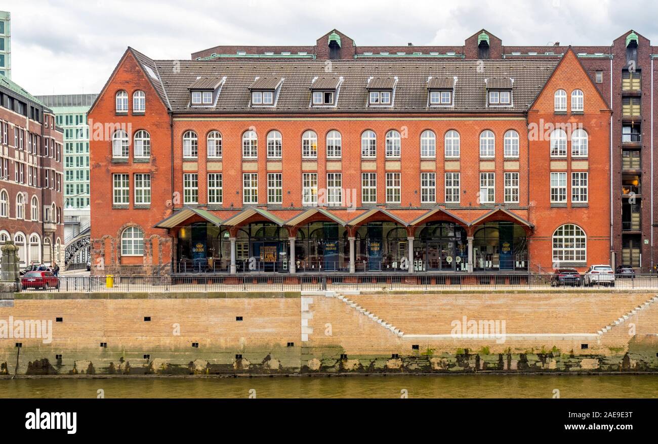 Urban regeneration  former warehouse redeveloped for commercial offices and retail in Speicherstadt Warehouse District Altstadt Hamburg Germany Stock Photo