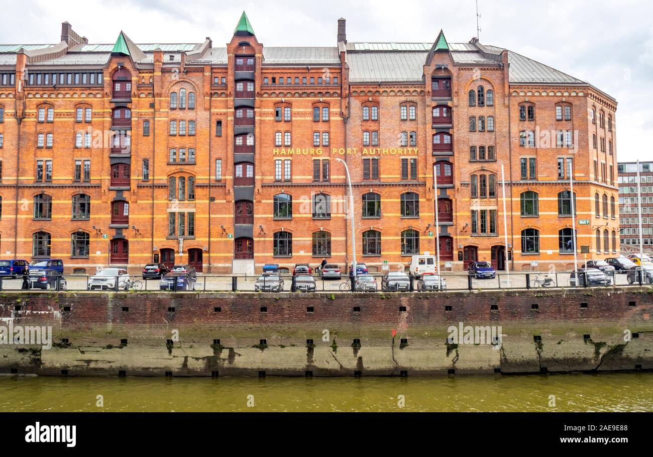 Port Authority red brick building former warehouse in Speicherstadt Warehouse District on waterfront of Zoll Canal Altstadt Hamburg Germany. Stock Photo