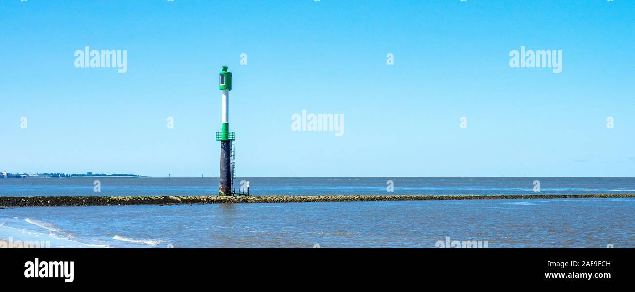 Green lateral buoy navigational marker on the Elbe River Cuxhaven Lower Saxony Germany. Stock Photo