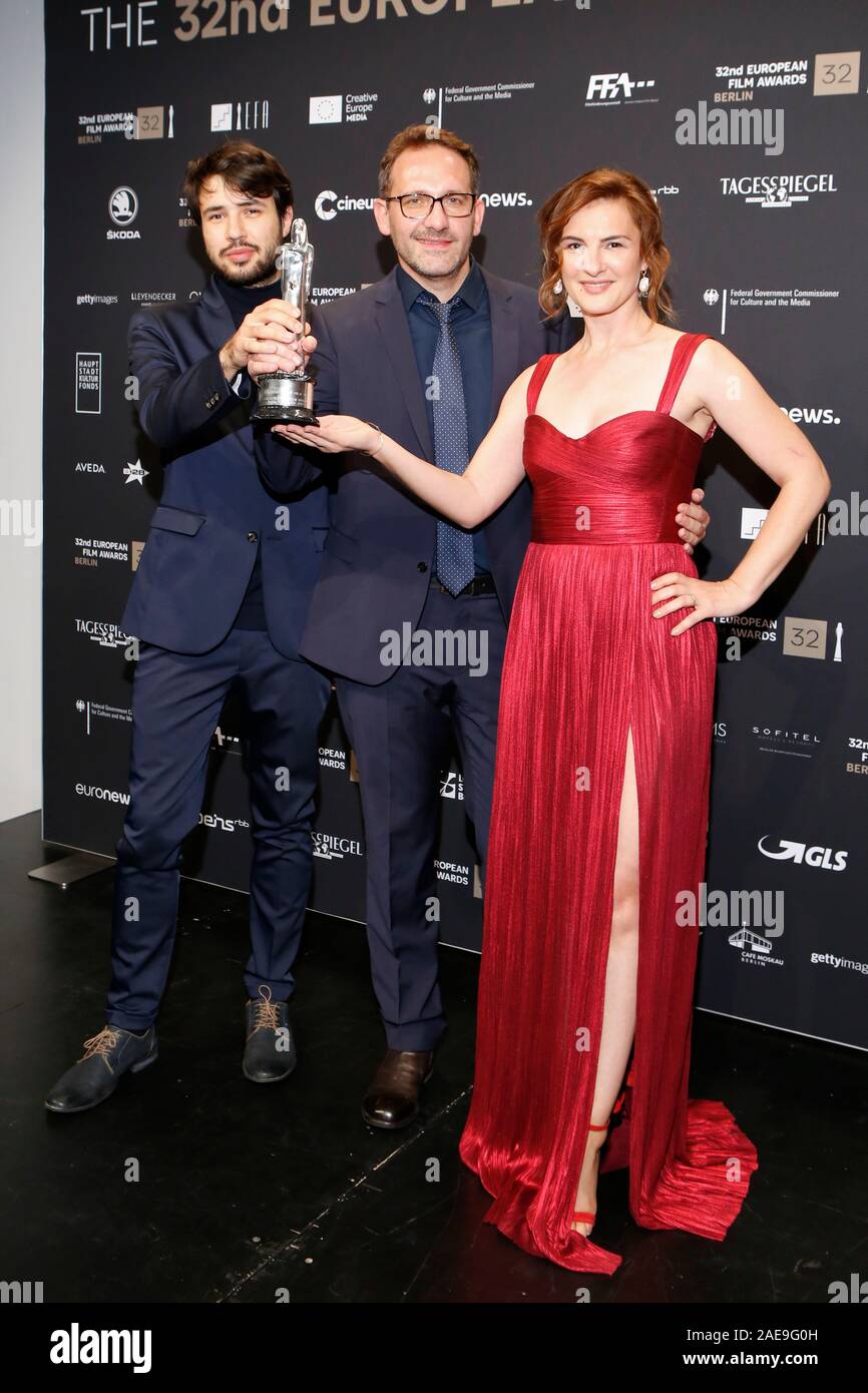 Berlin, Germany. December 7th, 2019. 32nd European Film Awards Ceremony at Haus der Berliner Festspiele in Berlin, Germany. Pictured: (L-R) Tudor Platon, Bogdan Muresanu, Ioana Flora with award in category EUROPEAN SHORT FILM for ' The Christmas Gift'   © Piotr Zajac/Alamy Live News Stock Photo