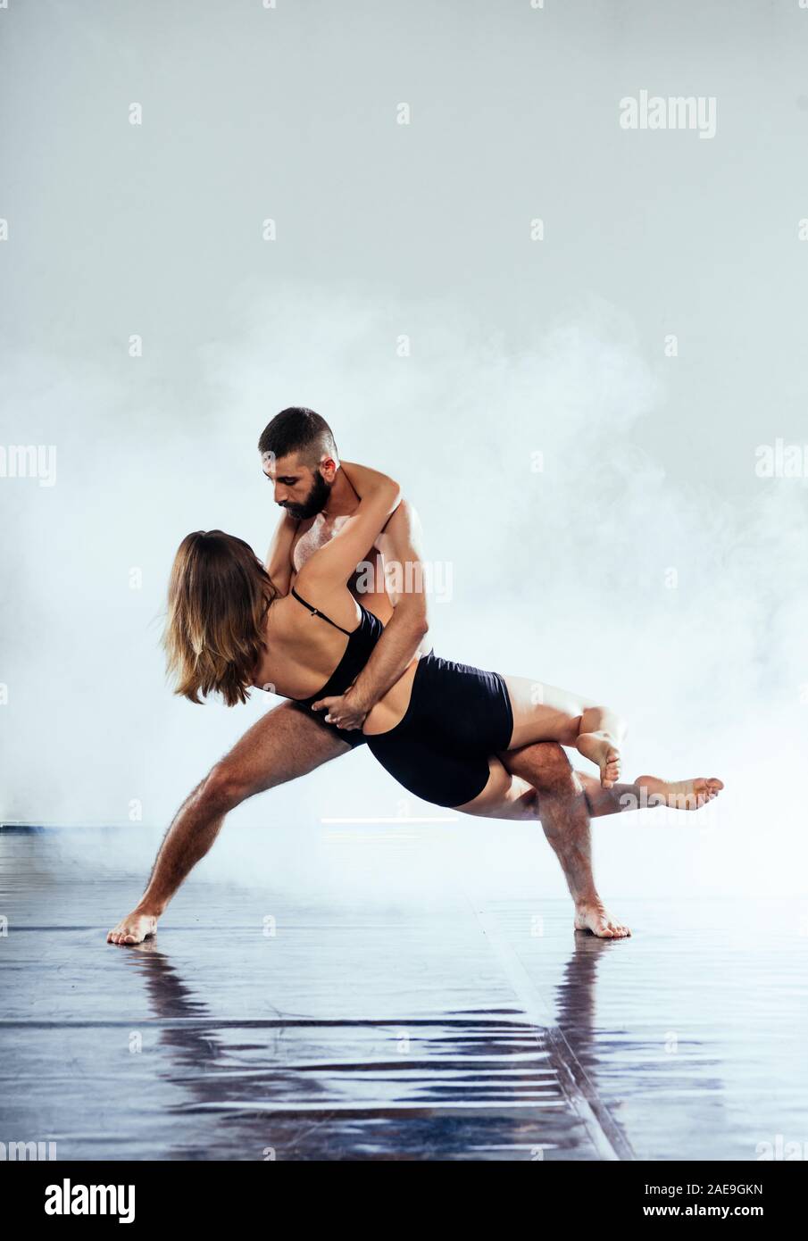 Modern dance artists practicing a choreographic ballet routine Stock ...