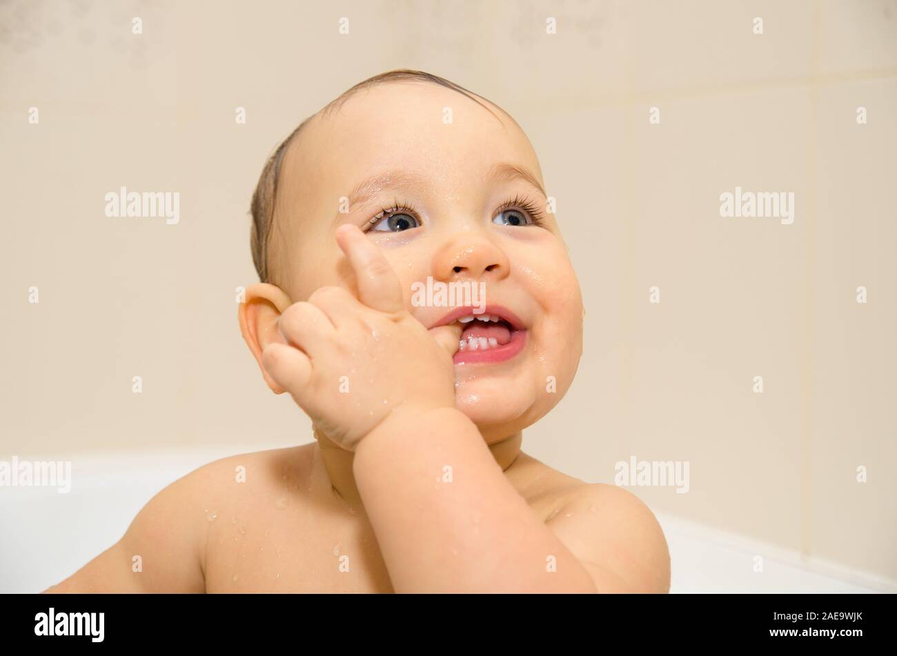 baby boy swimming in a bathroom Stock Photo Alamy