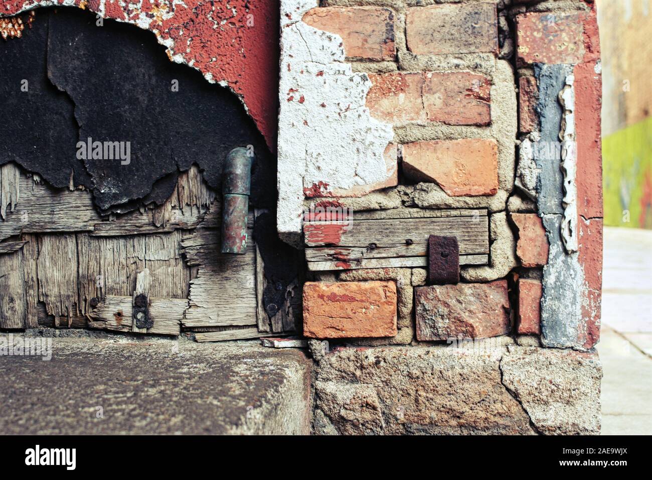 an old infrastructure crumbles, revealing textures Stock Photo