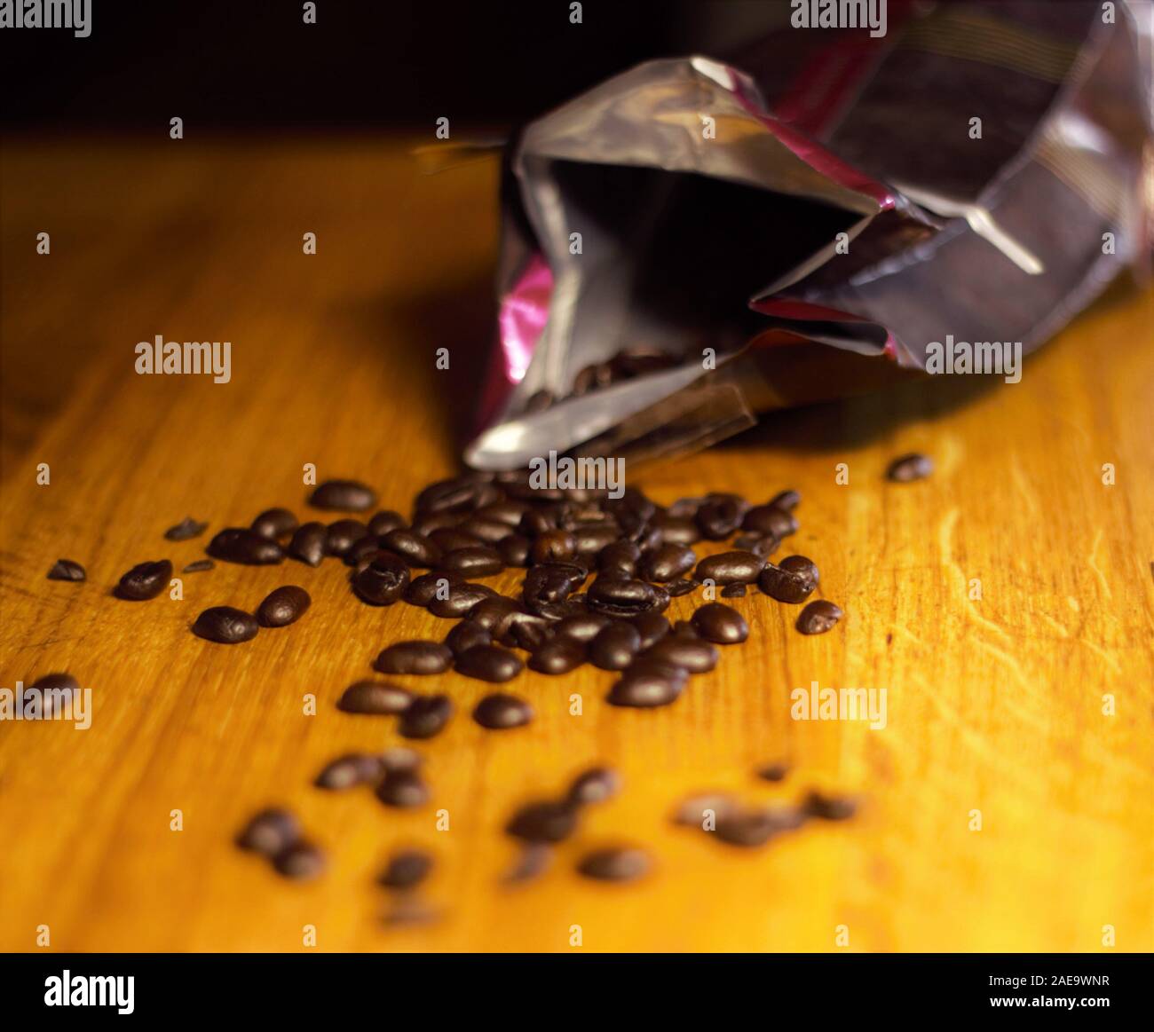 Coffee Beans Spilled on Counter Well-lit Stock Photo