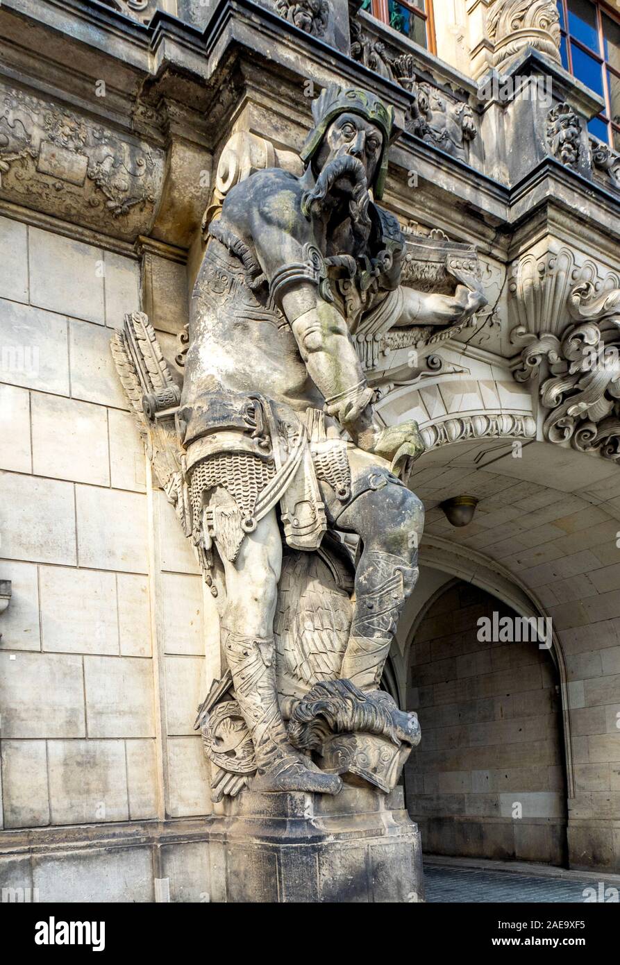 Stone sculpture statue beside archway of Georgentor Dresden Castle Royal Palace Dresden Saxony Germany. Stock Photo
