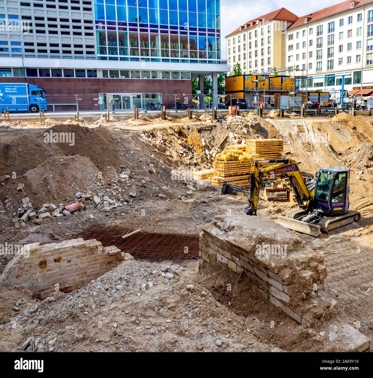 Excavator in building site in central Dresden Saxony Germany. Stock Photo