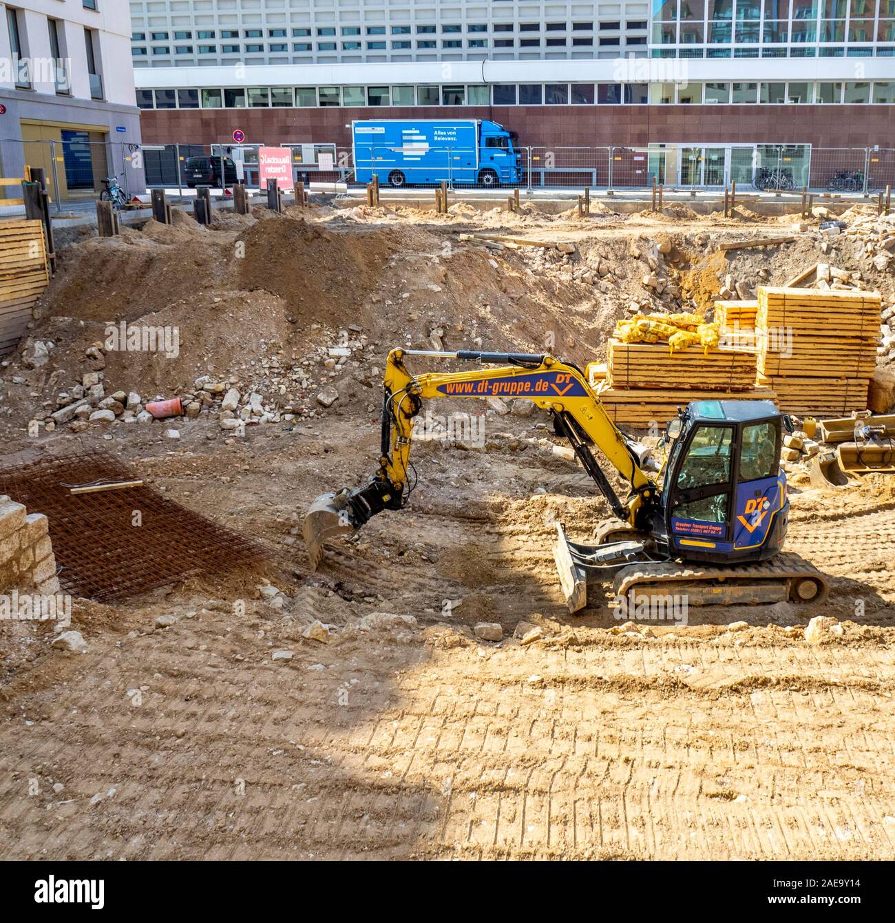 Excavator in building site in central Dresden Saxony Germany. Stock Photo