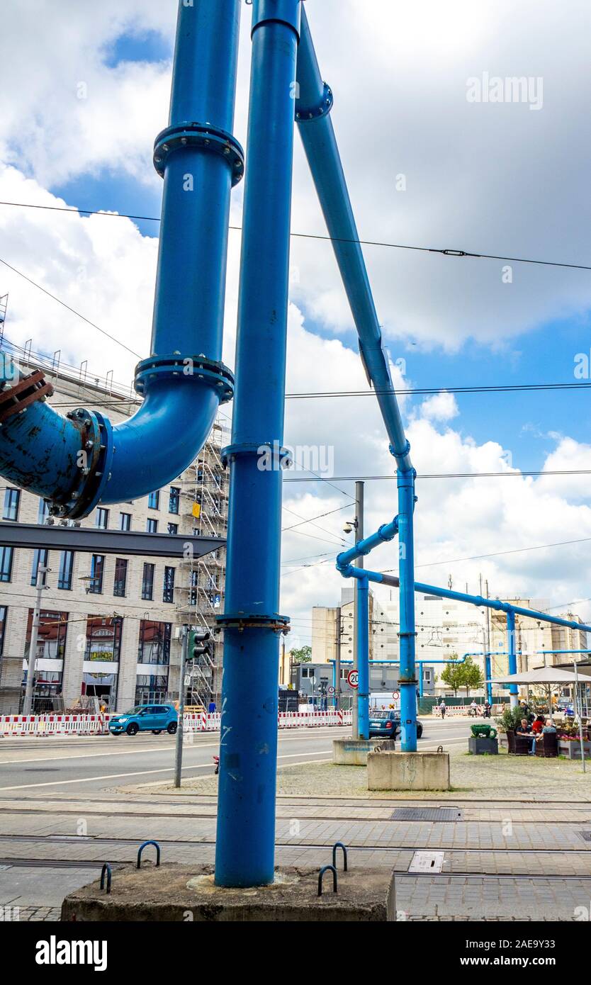 Above ground blue painted steel water pipes in central Dresden Saxony Germany. Stock Photo