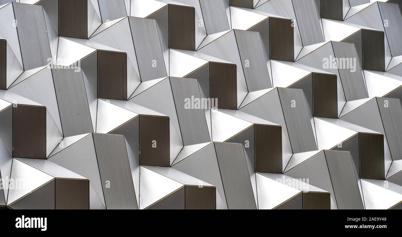 Abstract geometric shapes of cladding of facades of office building in central Dresden Saxony Germany. Stock Photo