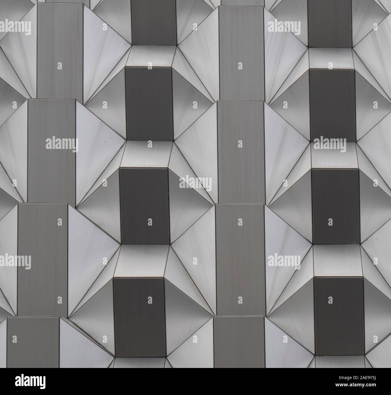 Abstract geometric shapes of cladding of facades of office building in central Dresden Saxony Germany. Stock Photo
