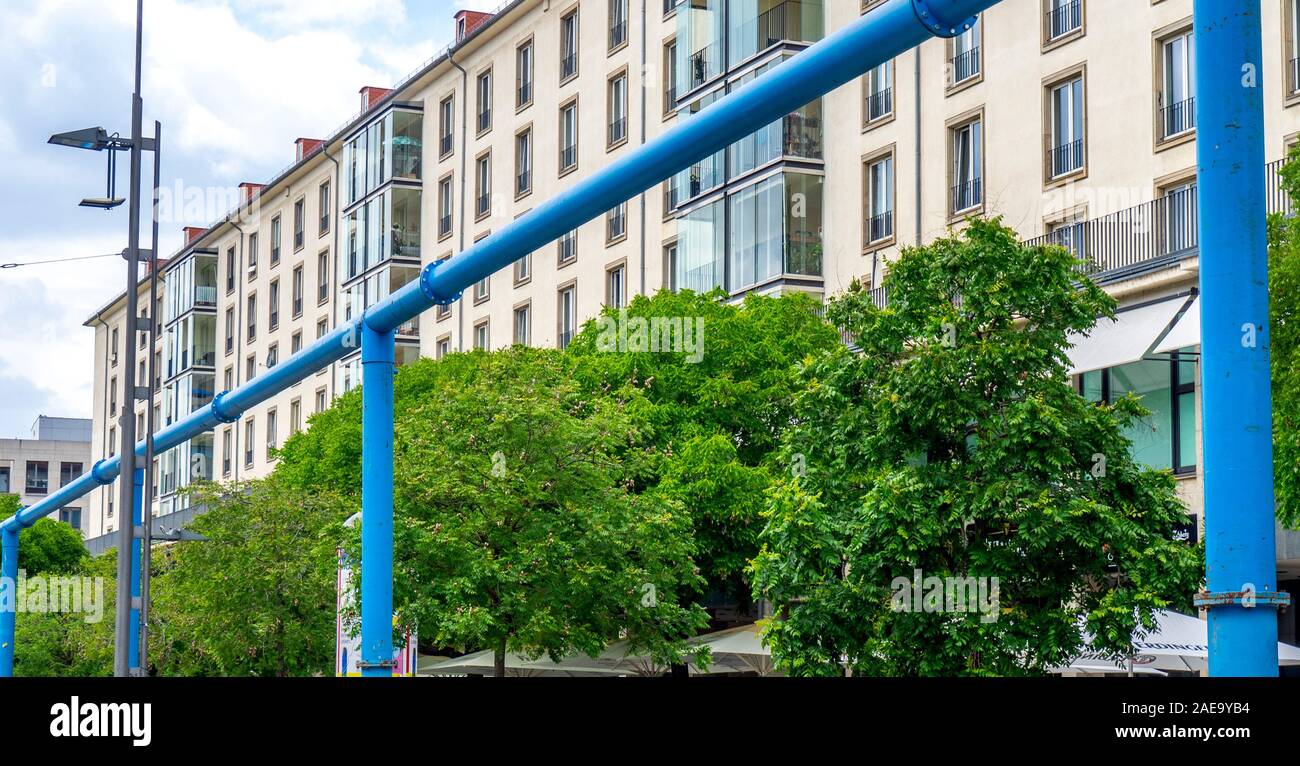 Above ground blue painted steel water pipes in central Dresden Saxony Germany. Stock Photo