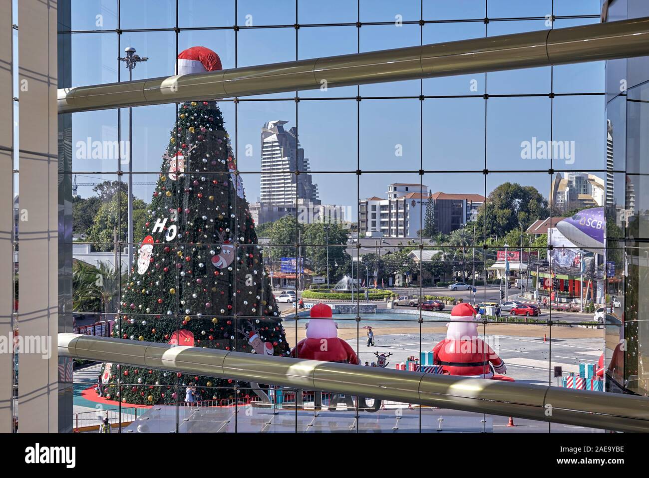 Through a window. View through window of Pattaya City, and Christmas decorations, Thailand, Southeast Asia Stock Photo