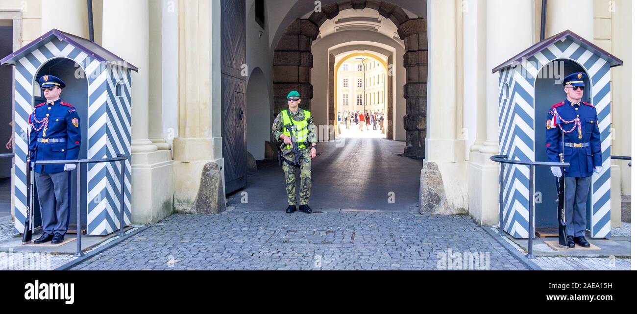Prague Castle Guards in front of sentry boxes and infantryman at Imperial Stables entrance to Prague Castle complex Prague Czech Republic. Stock Photo