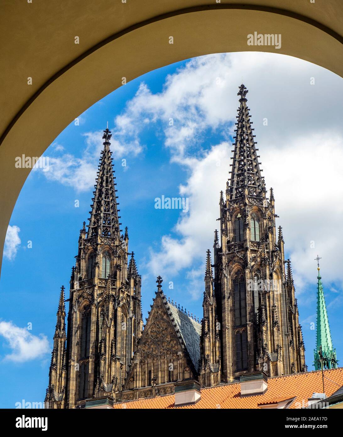 St Vitus Cathedral Gothic steeples and peak of Great Southern Tower seen from portico of Royal Palace Prague Castle Complex Prague Czech Republic. Stock Photo