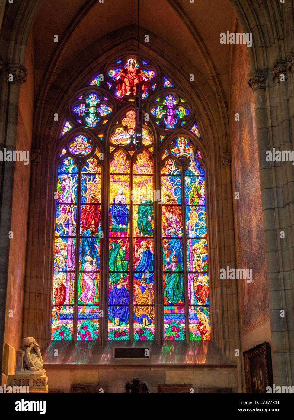 Detail of stain glass window in Gothic St Vitus Cathedral Prague Castle Complex Prague Czech Republic. Stock Photo