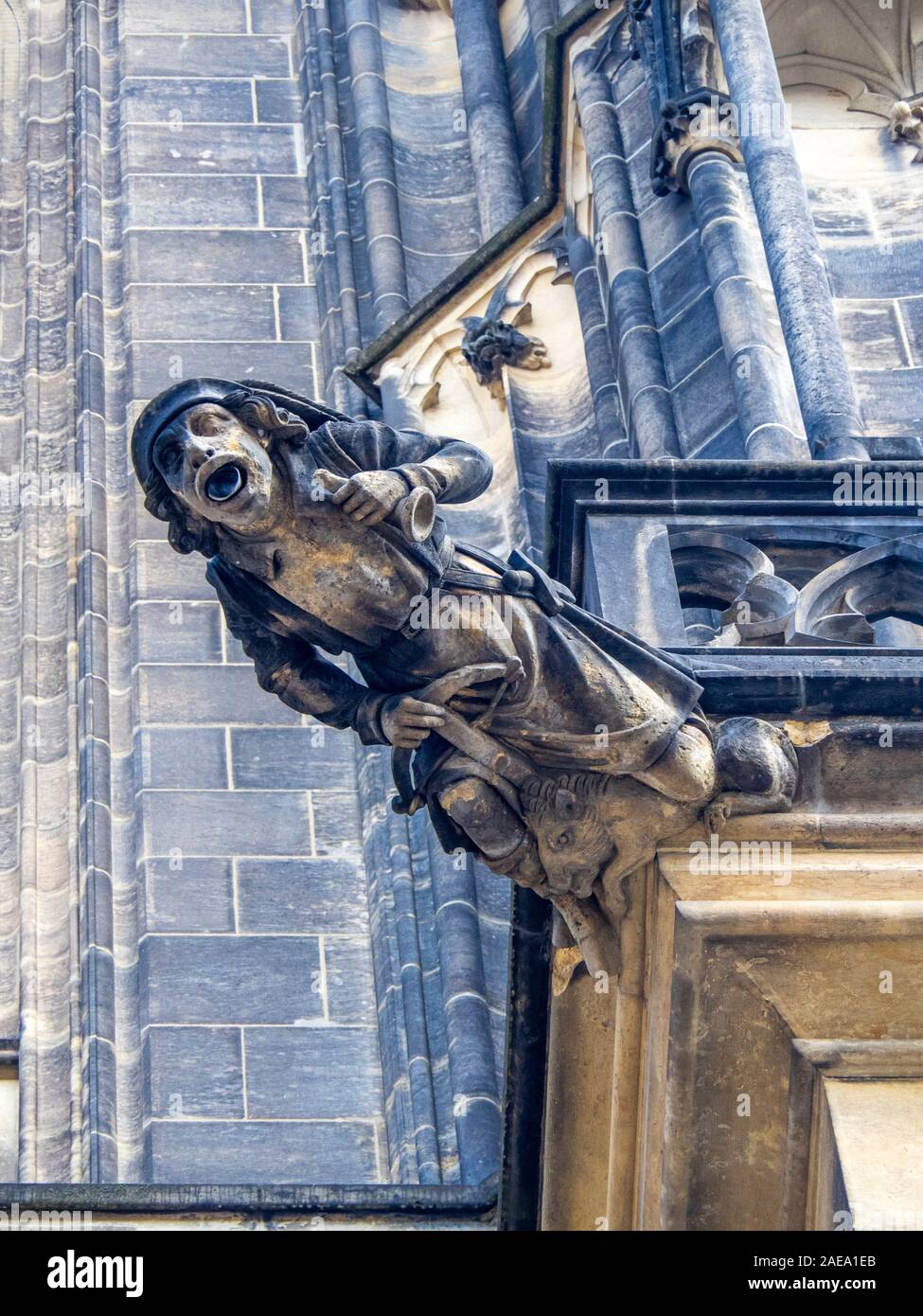 Detail of sandstone gargoyle of Gothic St Vitus Cathedral Prague Castle