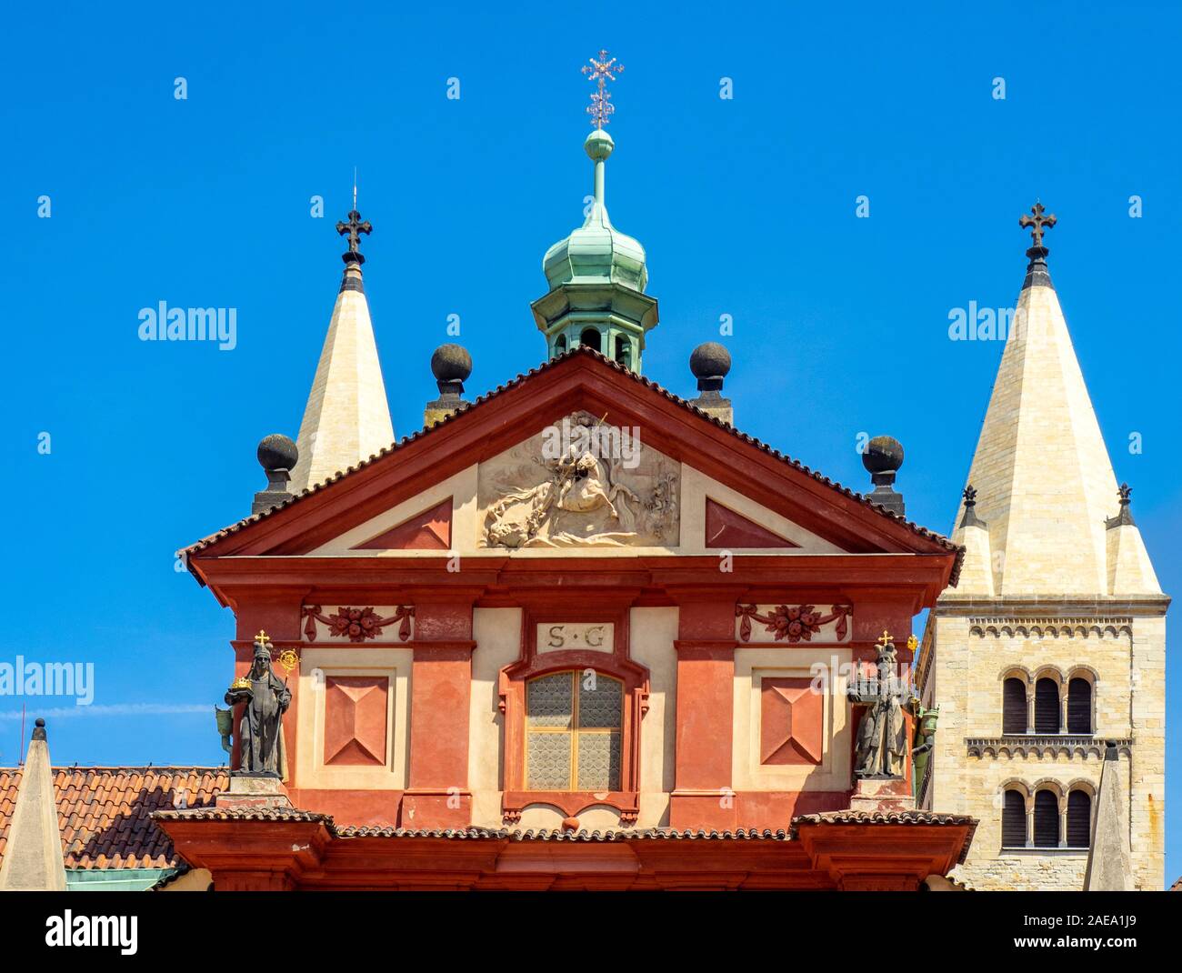 Sandstone statues of Vratislaus I and Blessed Mlada St George slaying dragon stone carving tympanum St George's Basilica Prague Czech Republic. Stock Photo
