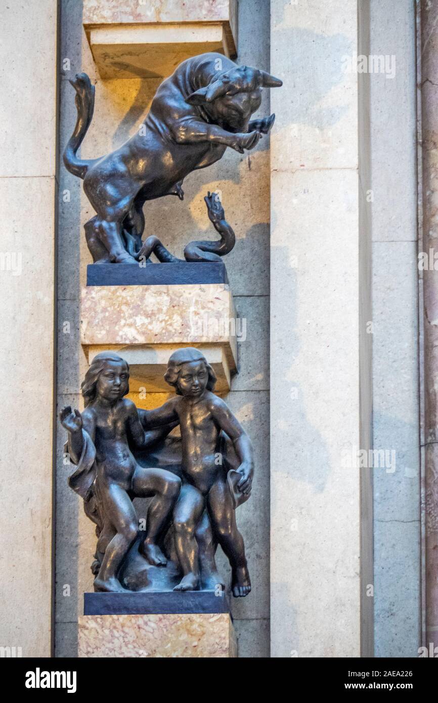 Bronze statuettes of zodiac signs Taurus the bull and Gemini the twins in Adria Passage Adria Palace Prague Czech Republic. Stock Photo