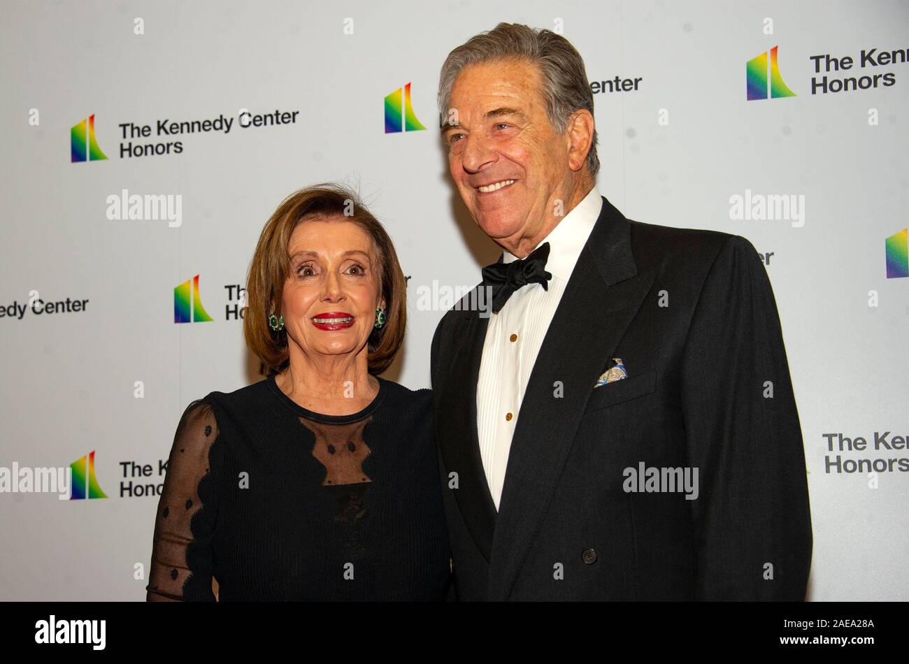 Washington DC, USA. 07th Dec, 2019. Speaker of the United States House of Representatives Nancy Pelosi (Democrat of California) and her husband, Paul, arrive for the formal Artist's Dinner honoring the recipients of the 42nd Annual Kennedy Center Honors at the United States Department of State in Washington, DC on Saturday, December 7, 2019. The 2019 honorees are: Earth, Wind & Fire, Sally Field, Linda Ronstadt, Sesame Street, and Michael Tilson Thomas. Credit: MediaPunch Inc/Alamy Live News Stock Photo