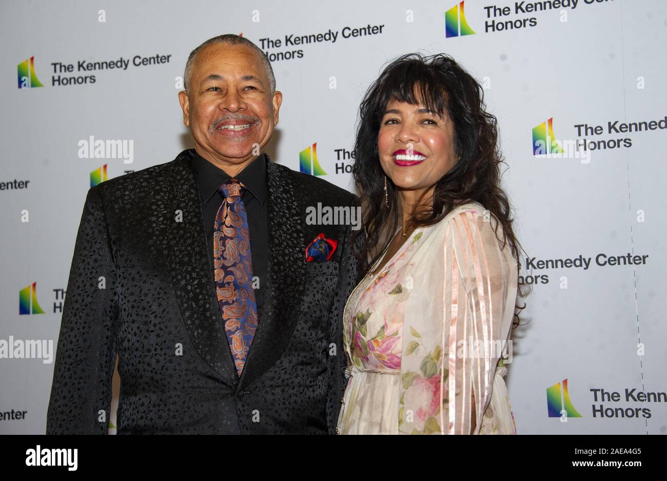 Washington, USA. 07th Dec, 2019. Percussionist Ralph Johnson of Earth, Wind and Fire and his wife, Susan Johnson, arrive for the formal Artist's Dinner honoring the recipients of the 42nd Annual Kennedy Center Honors at the USA Department of State in Washington, DC on Saturday, December 7, 2019. The 2019 honorees are: Earth, Wind & Fire, Sally Field, Linda Ronstadt, Sesame Street, and Michael Tilson Thomas.Credit: Ron Sachs/Pool via CNP Credit: UPI/Alamy Live News Stock Photo