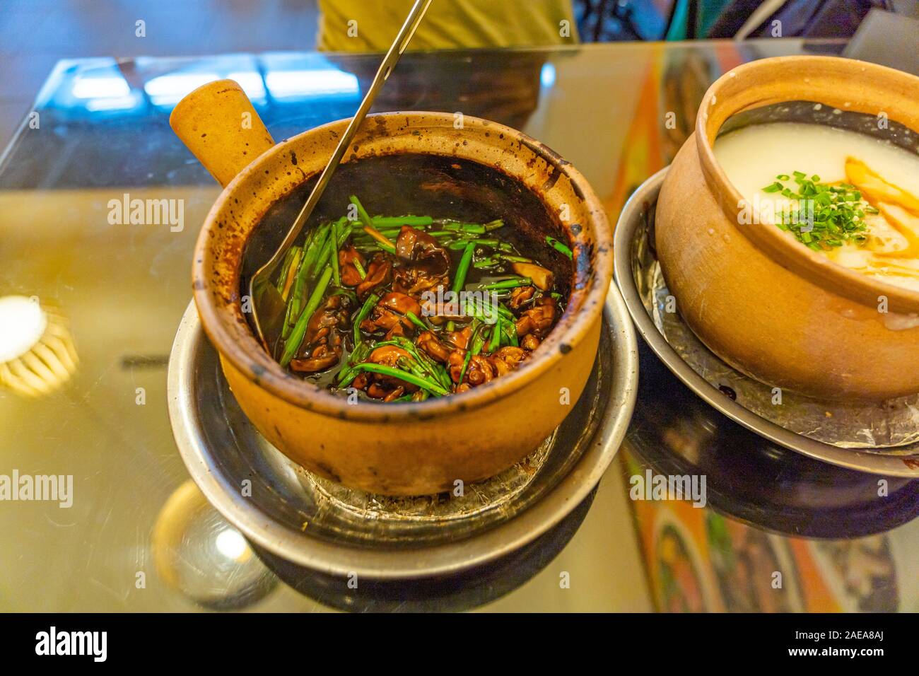 Famous Singapore dish frog and spring onion congee porridge Stock Photo Alamy
