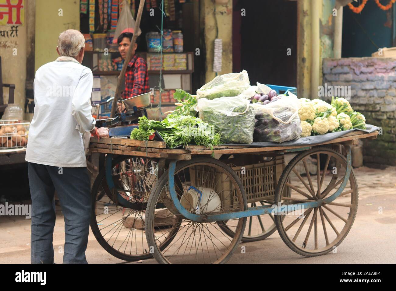 A vegetables seller with his cart on the road of Varanasi Stock Photo