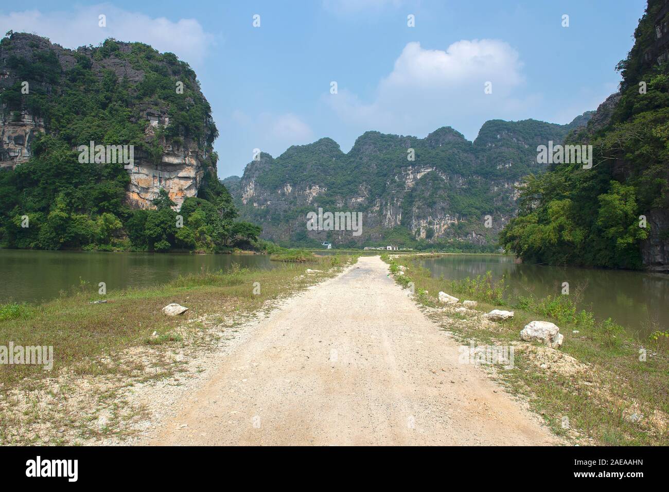 Panoramic view of karst formations in Tam Coc, a part of Trang An Complex , was declared a UNESCO World Heritage Natural and Cultural Monument.Ninh Bi Stock Photo