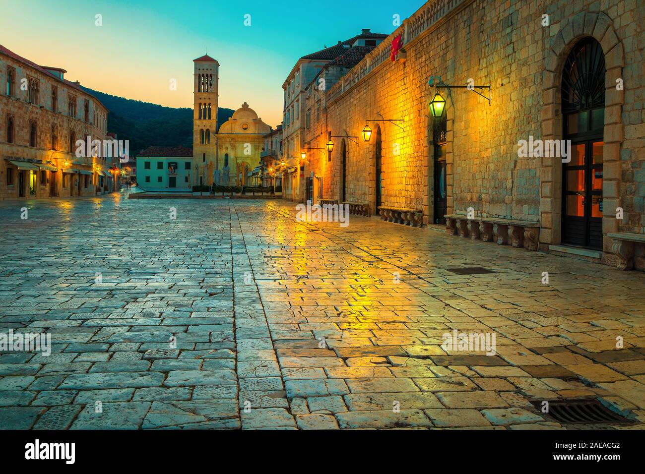 Majestic mediterranean old city center at dawn with famous Saint Stephen cathedral. Beautiful travel and touristic location, Hvar town, Hvar island, D Stock Photo