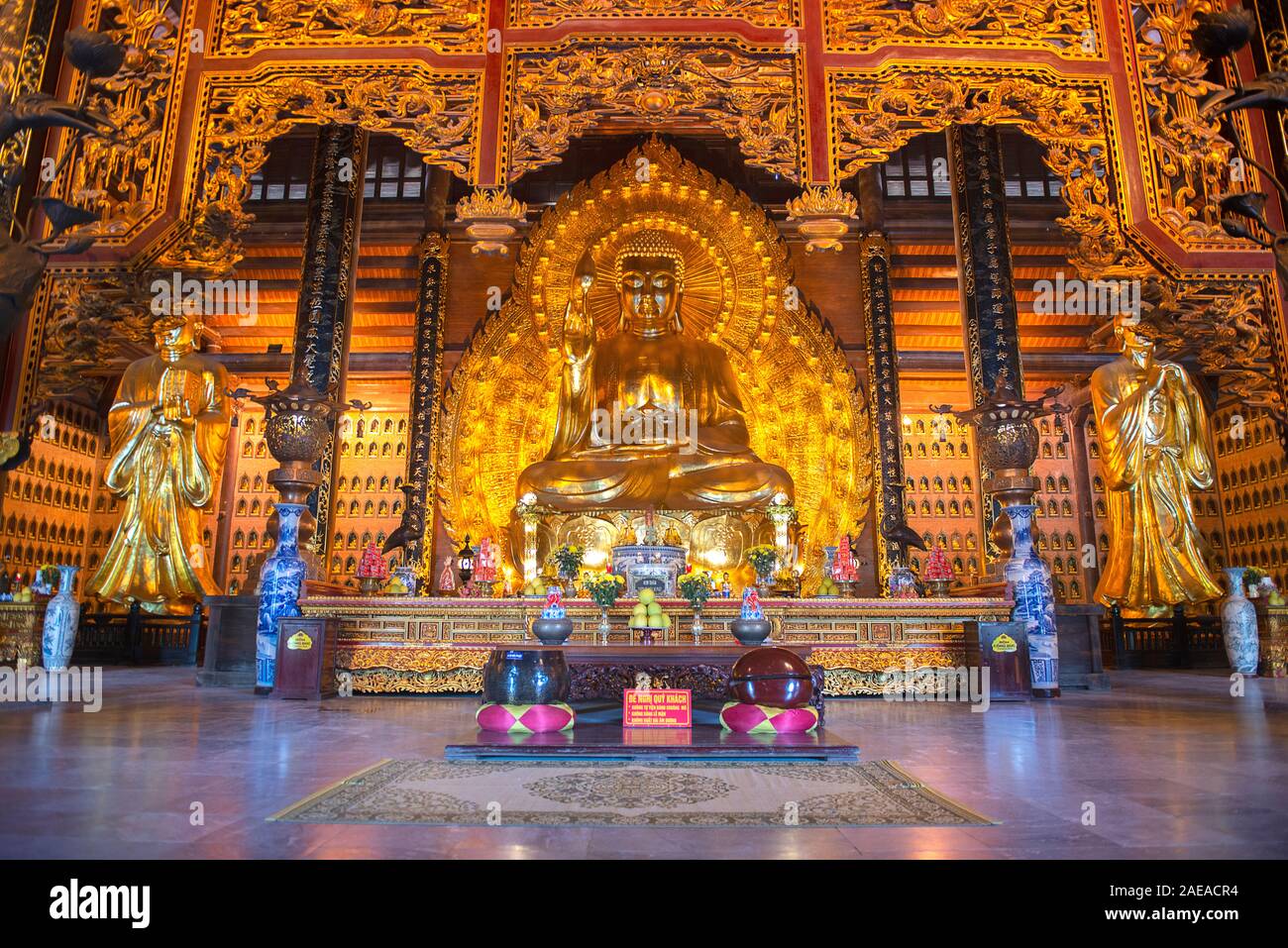 Shakyamuni , Golden Buddha Statue in the Bai Dinh Pagoda temple complex, Trang An, popular attraction of Ninh Binh, Vietnam Stock Photo