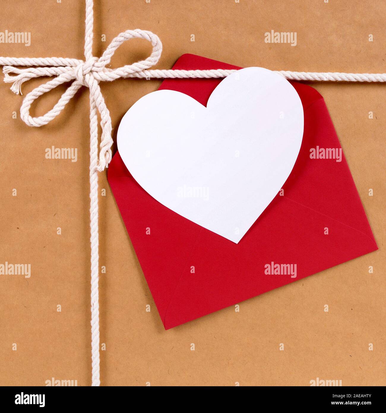 Valentine Gift With Gift Tag Brown Paper Package Parcel Background