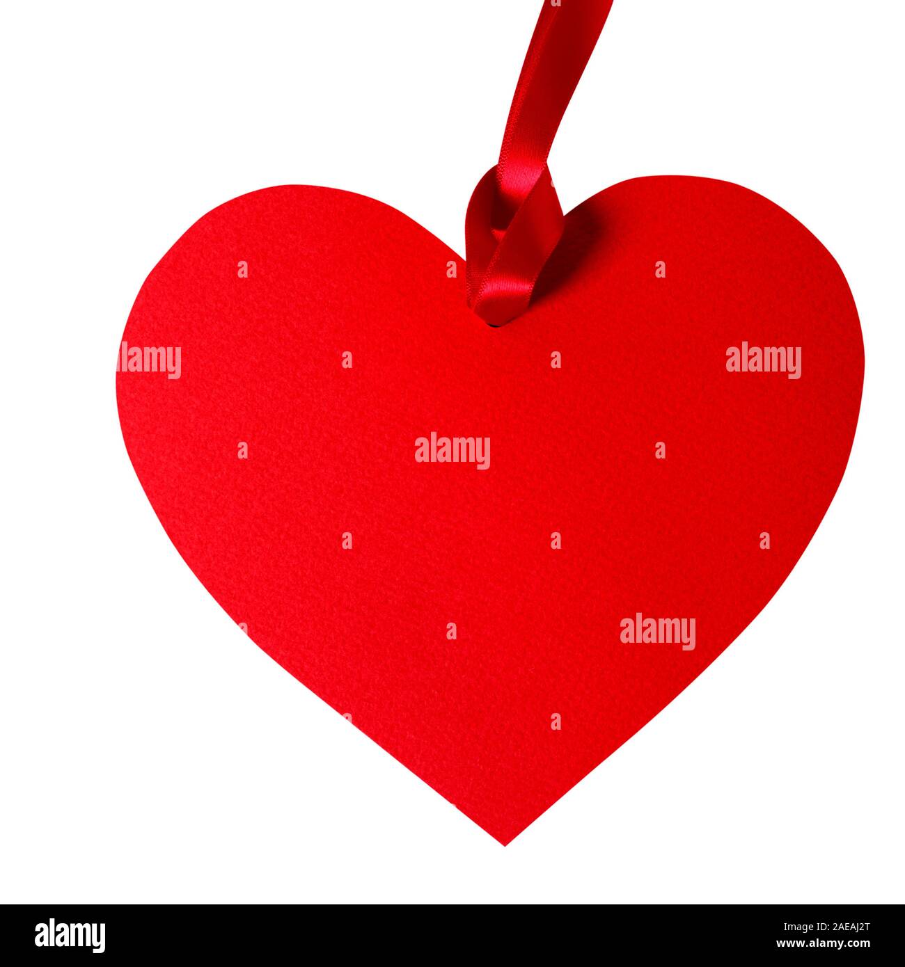 Valentine card or heart shaped gift tag with red ribbon isolated on a ...