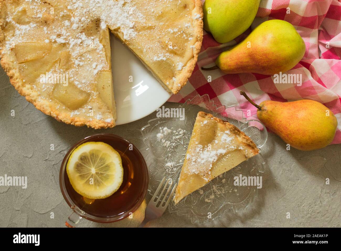 Pear cake. Autumn pear cake. Close-up. Flat lei. Stock Photo