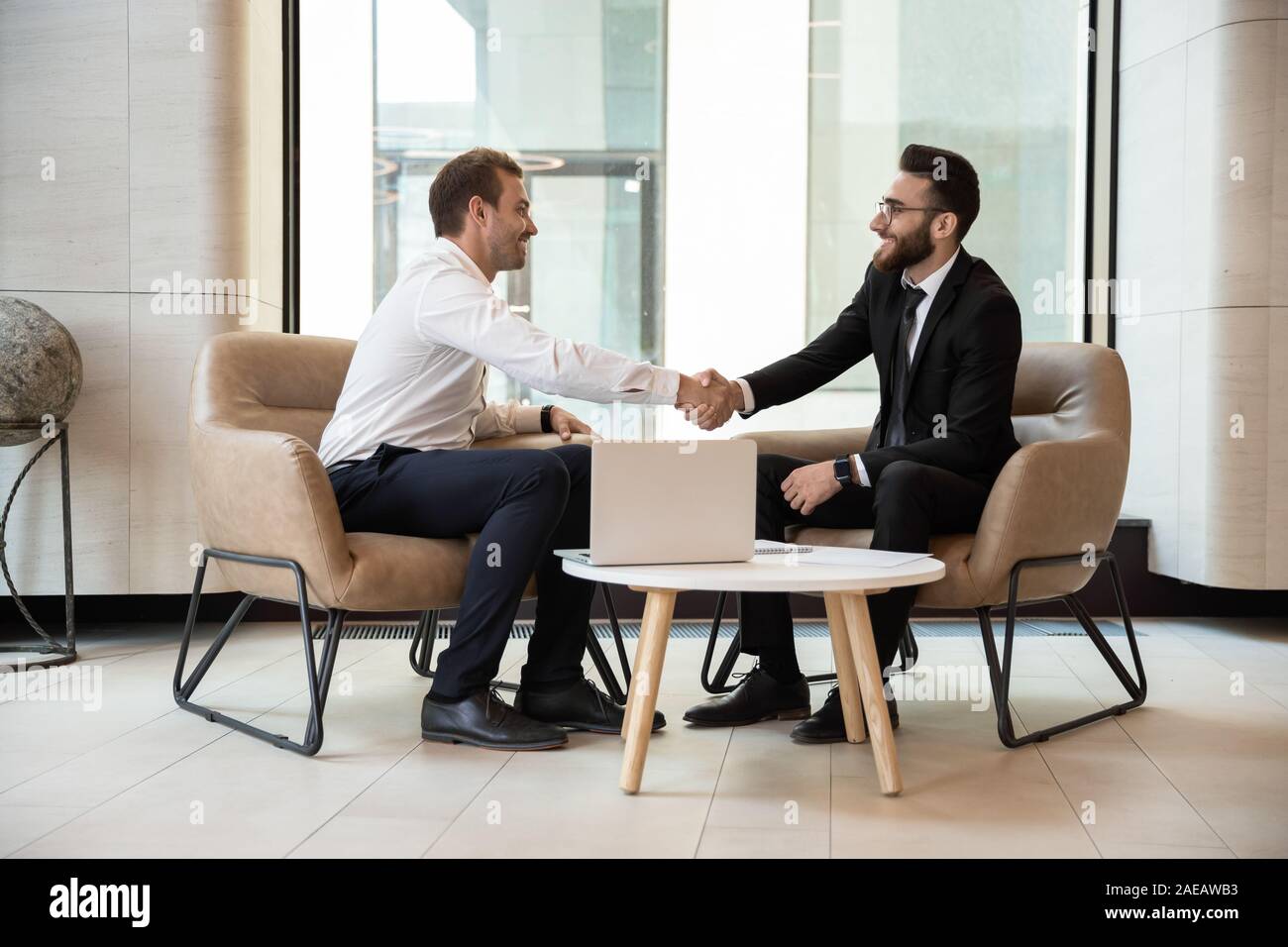 Multiracial Businessmen Handshake Getting Acquainted At Meeting Stock Photo Alamy