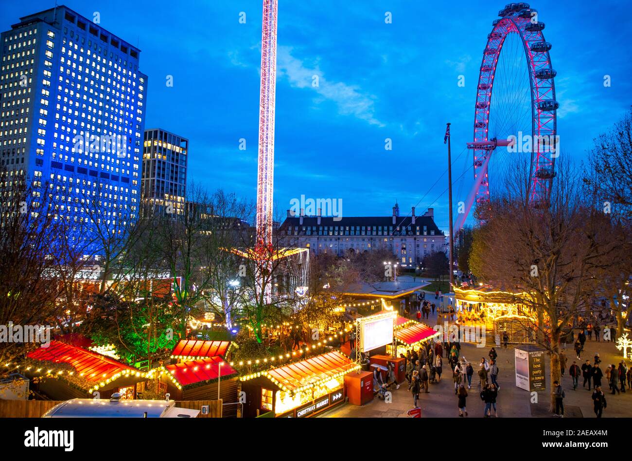 London, Christmas Market on the Thames, Winter Festival at Southbank Centre, London Eye Ferris Wheel, River Promenade, Stock Photo