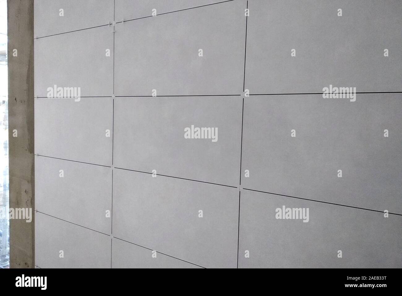 Wall ceramic tiles installation on mortar glue Stock Photo Alamy