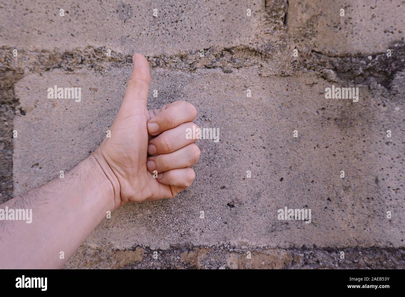 man hand making ok gesture, thumb up Stock Photo