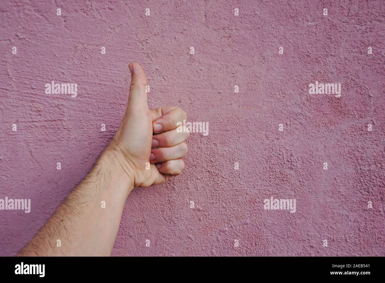man hand making ok gesture, thumb up Stock Photo