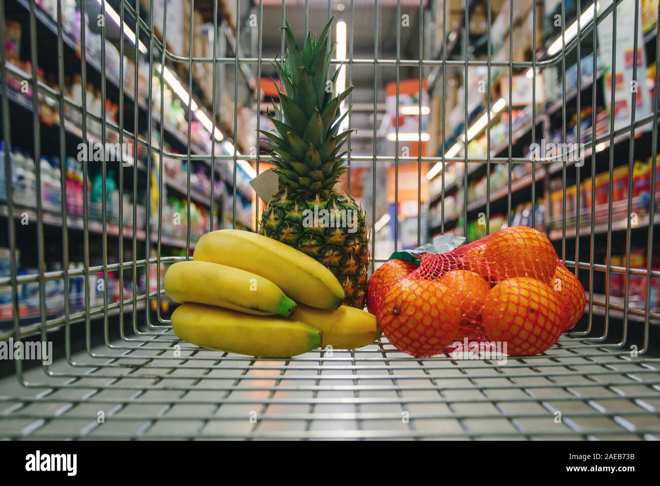 Bananas in supermarket trolley cart hires stock photography and images
