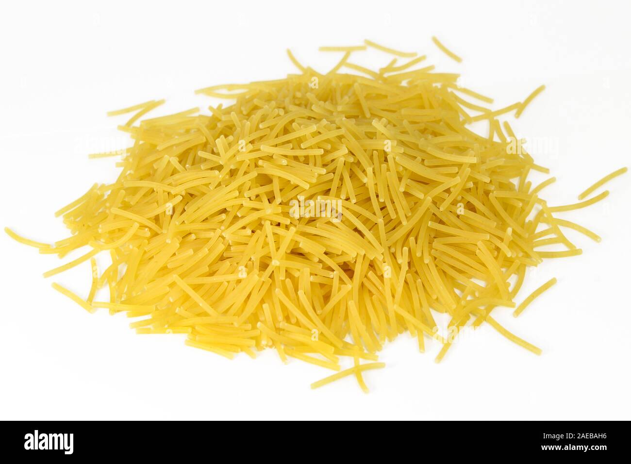 Raw uncooked vermicelli isolated on white Stock Photo Alamy
