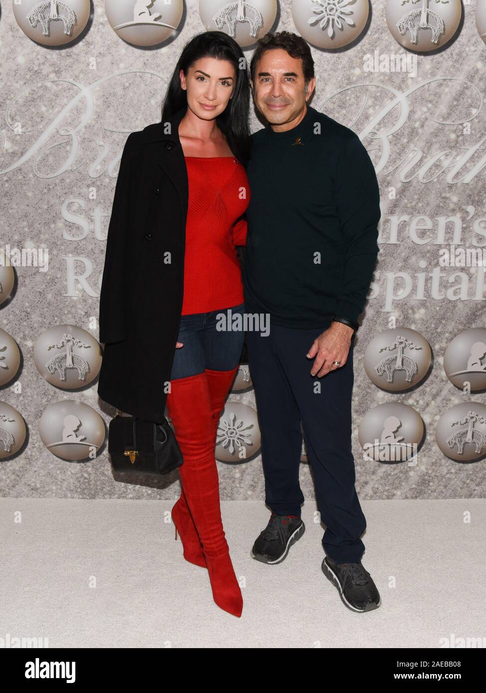 December 7, 2019, West Hollywood, California, USA: Brittany Pattakos and Paul Nassif attends Brooks Brothers Host Annual Holiday Celebration in West Hollywood to Benefit St. Jude. (Credit Image: © Billy Bennight/ZUMA Wire) Stock Photo