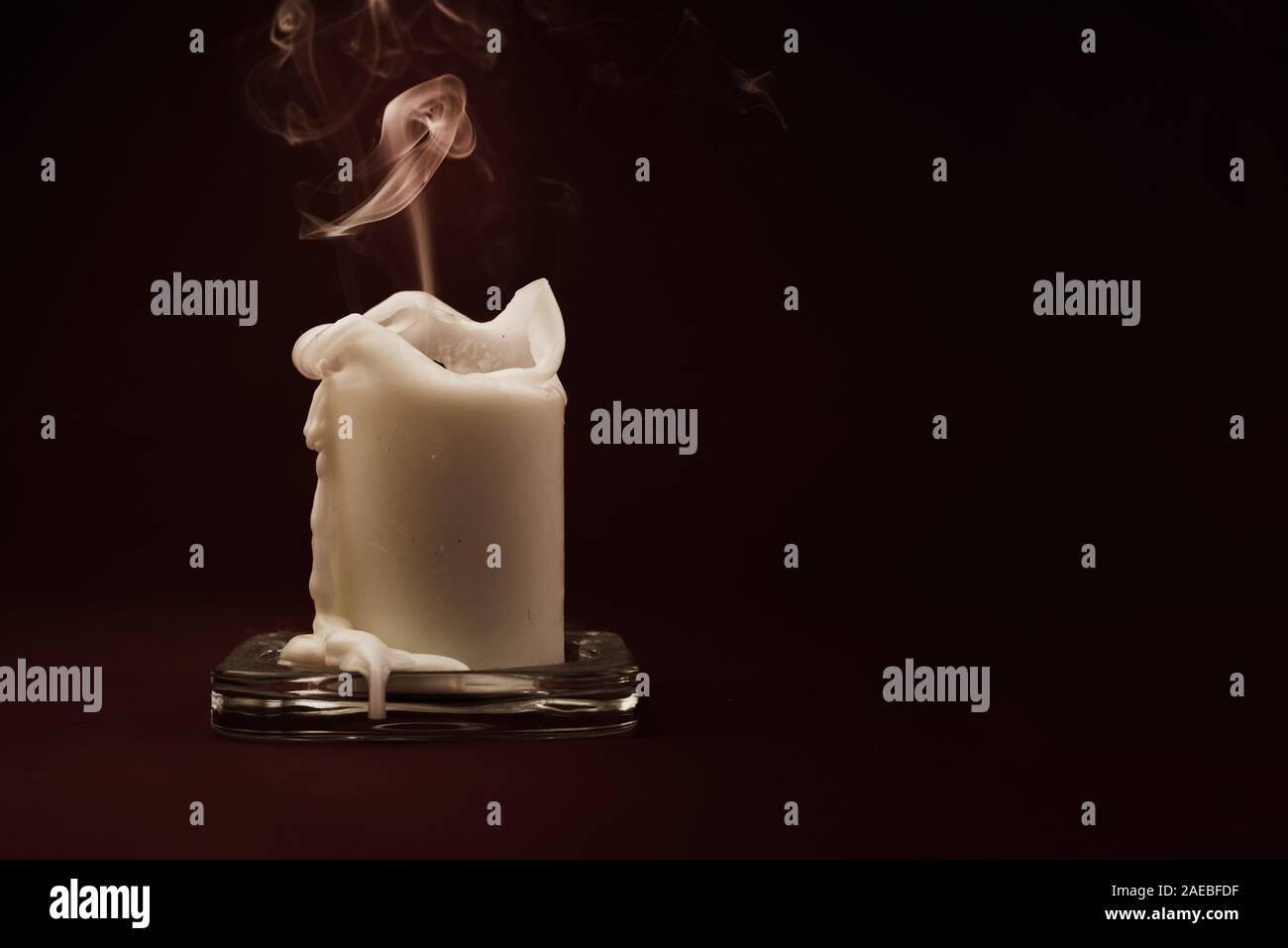 Candle blow off with smoke. End of life symbolism Stock Photo Alamy