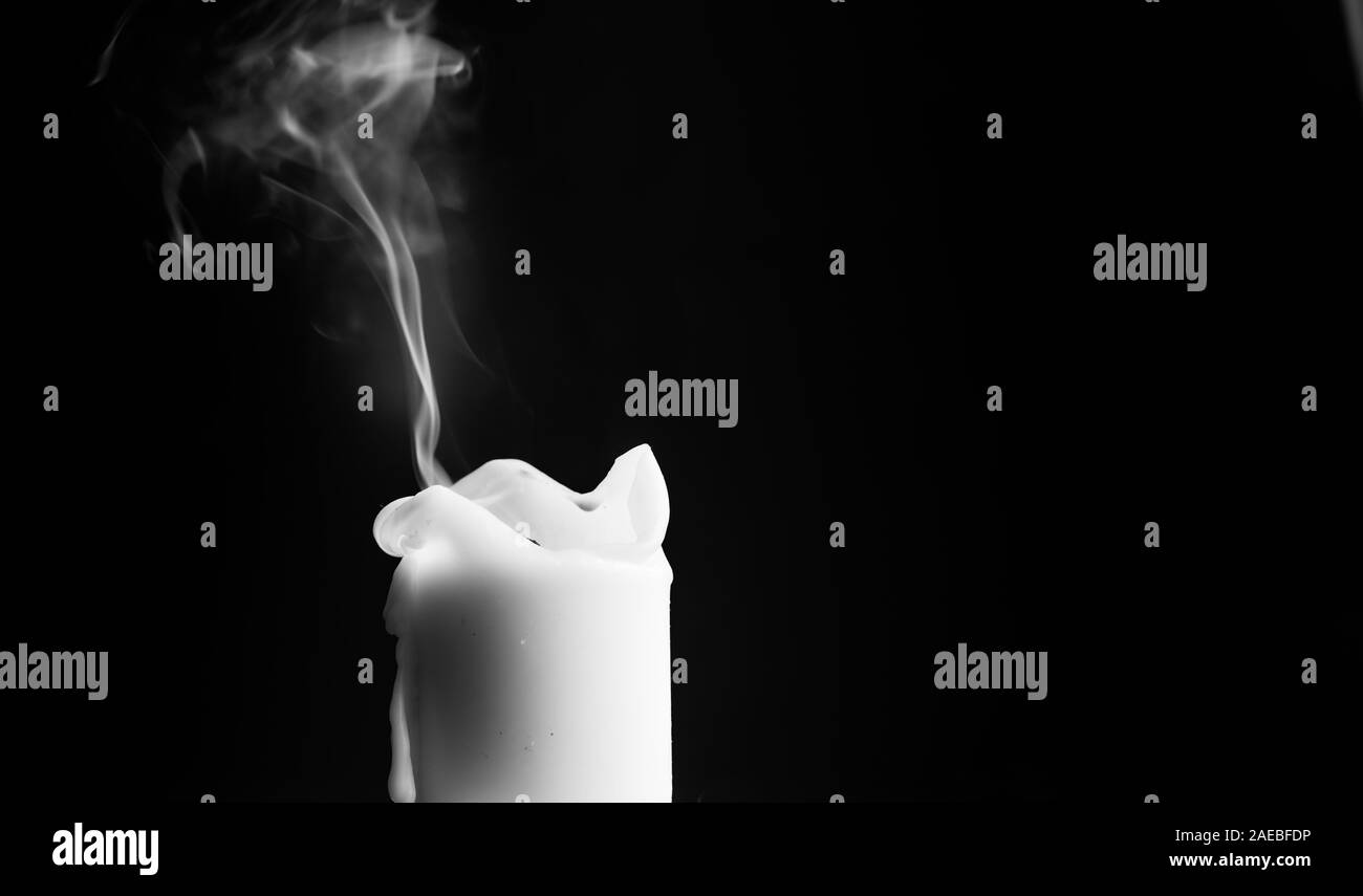 One light candle burning brightly in the black background Stock Photo Alamy