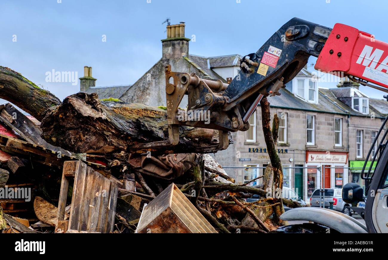 Biggar, South Lanarkshire, Scotland 8th December 2019:  Building the Biggar hogmanay bonfire has started in earnest. Stock Photo