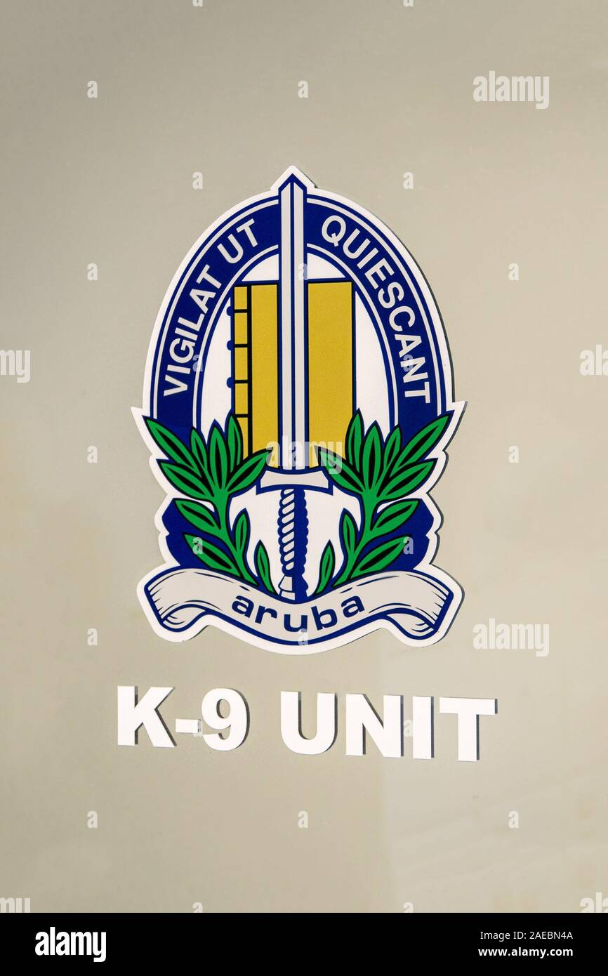 Aruba, 11/26/2019: View of the K-9 unit emblem posted near passport control area of Queen Beatrix International Airport. Stock Photo