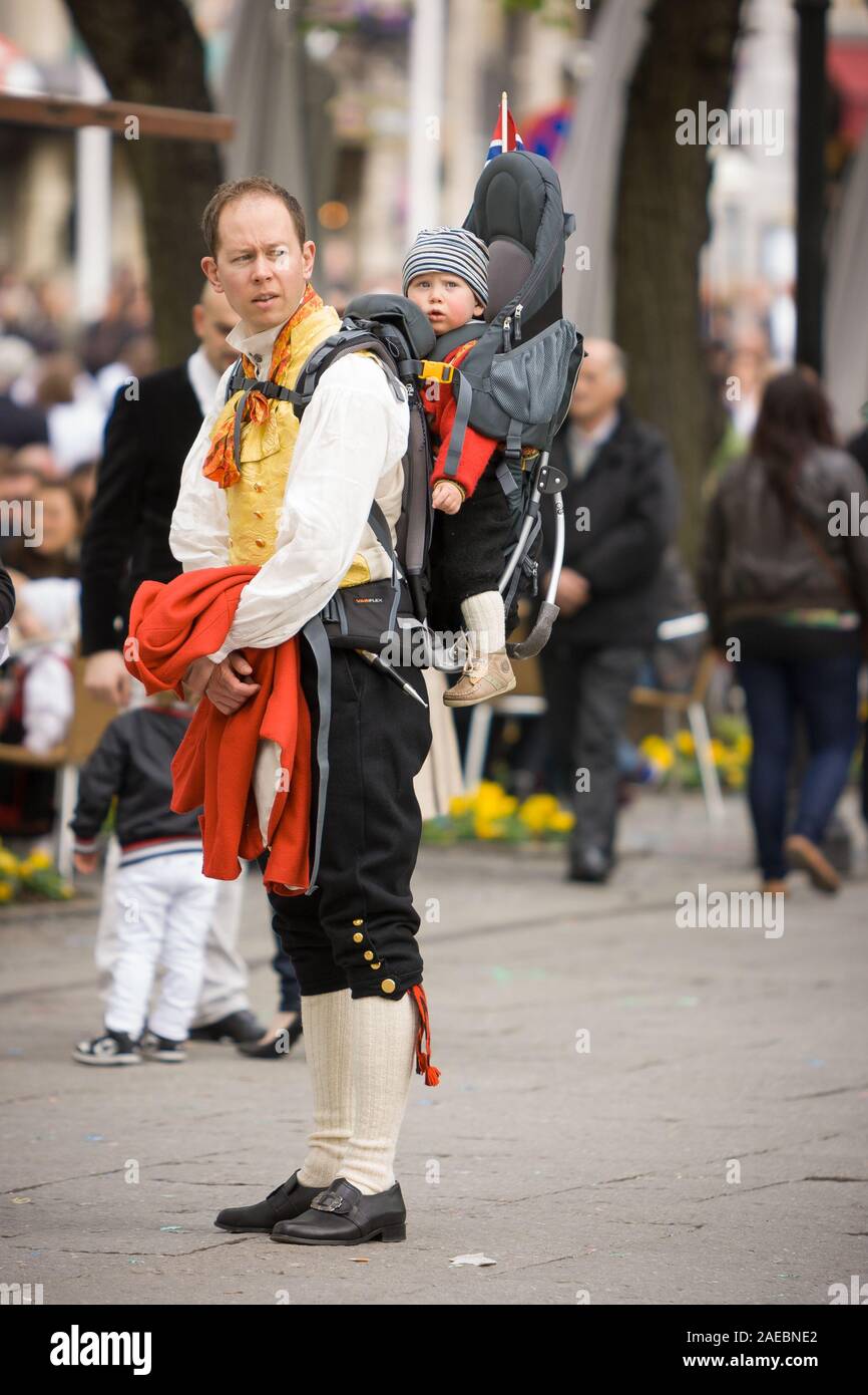 Oslo, Norway - May 17, 2010: National day in Norway. Norwegians after traditional celebration and parade on Karl Johans Gate street. Stock Photo