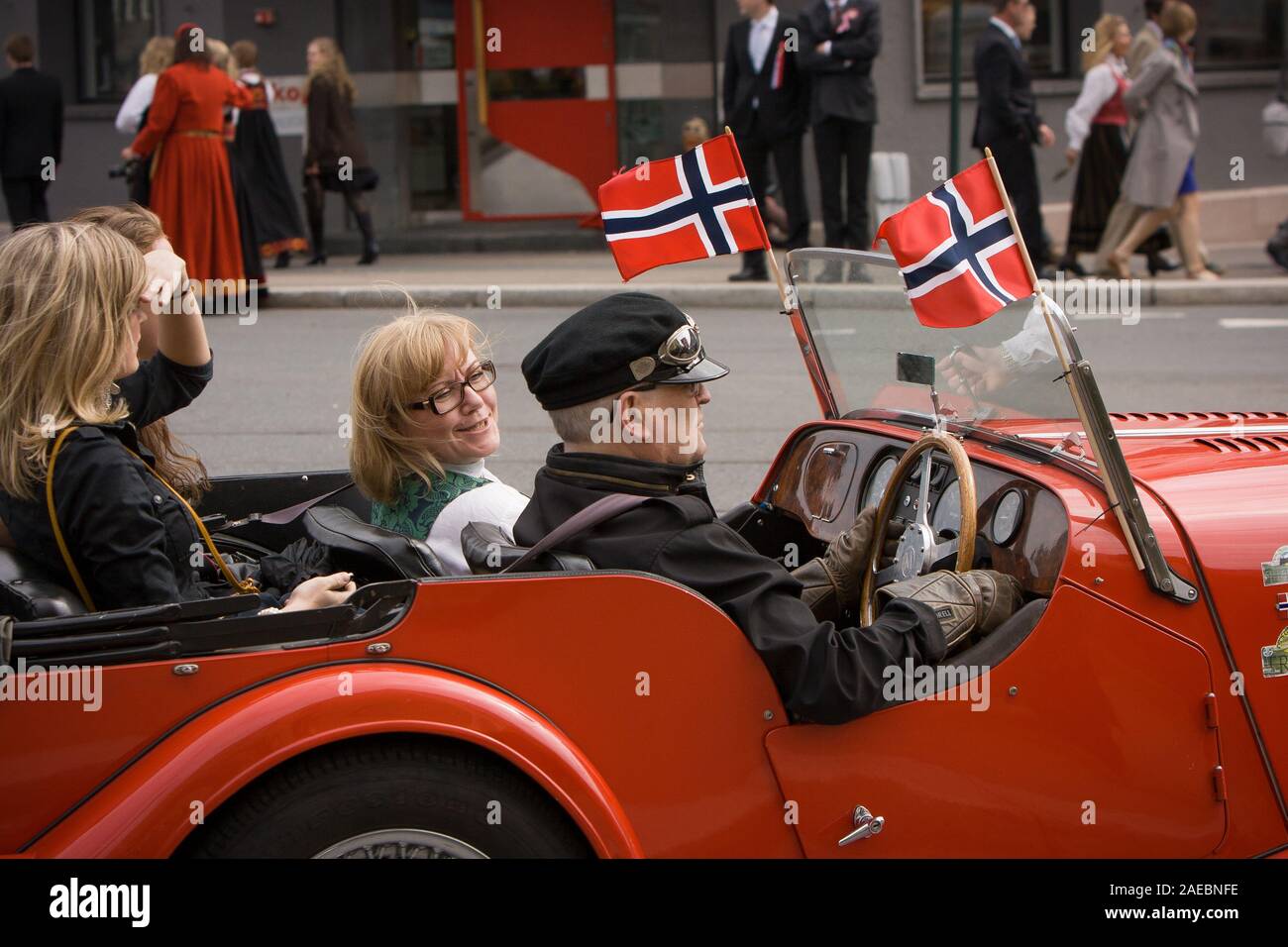 Oslo, Norway - May 17, 2010: National day in Norway. Norwegians on traditional celebration and parade on Karl Johans Gate street. Stock Photo