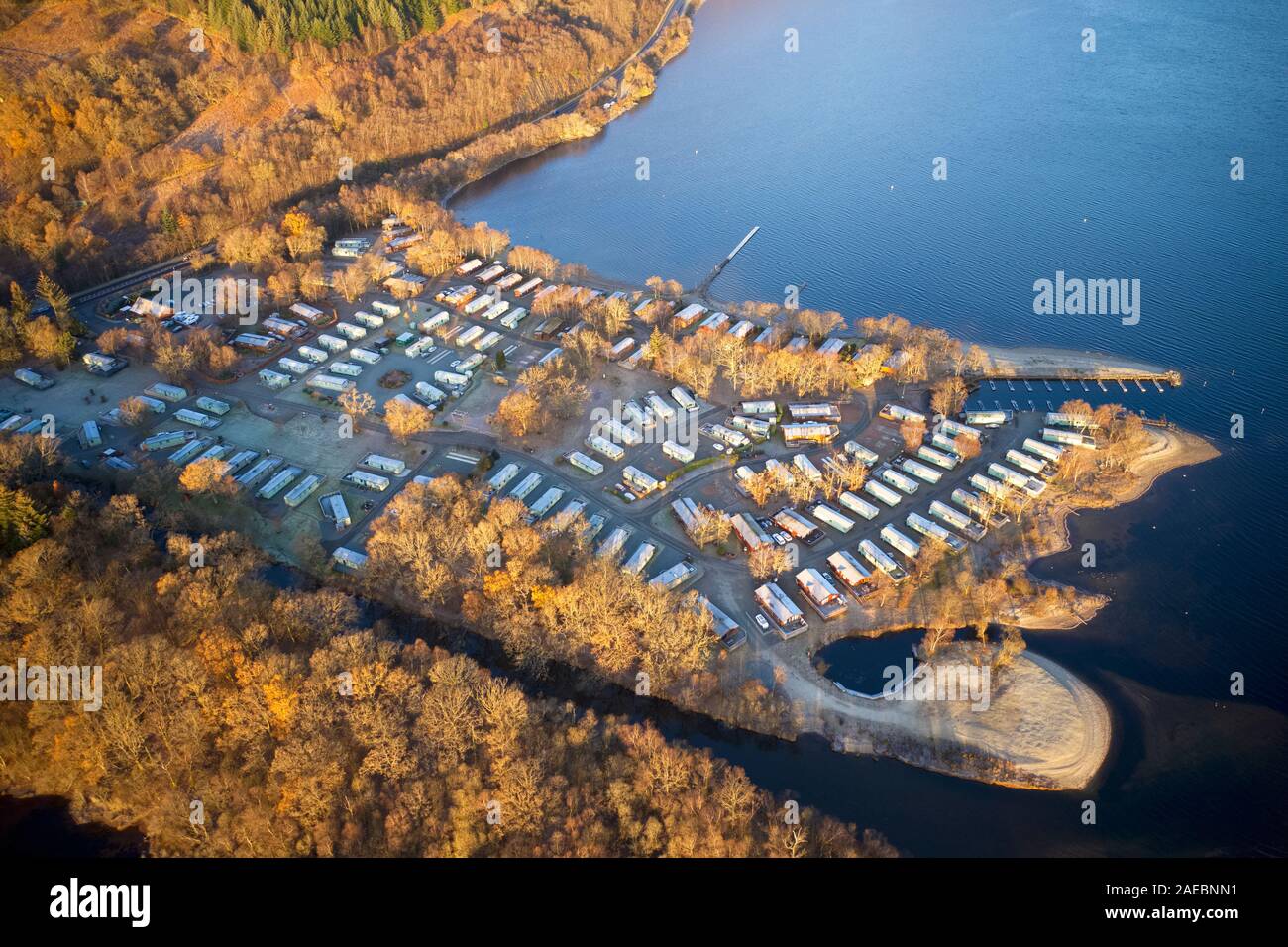 Caravan site island park at lake water edge aerial view closed during winter season at Loch Lomond Scotland UK Stock Photo