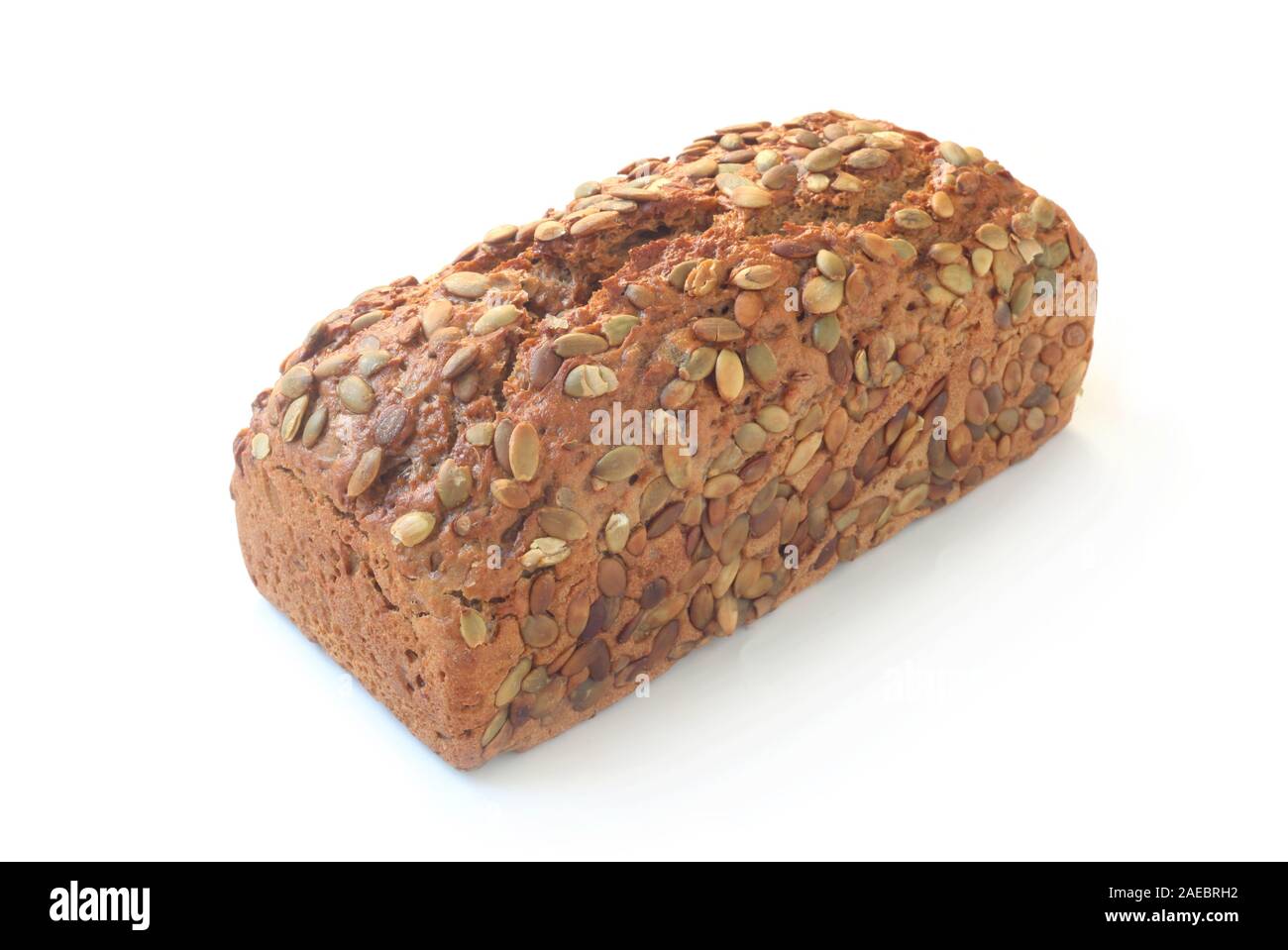 A Loaf Of Whole Grain Bread Isolated On White Stock Photo