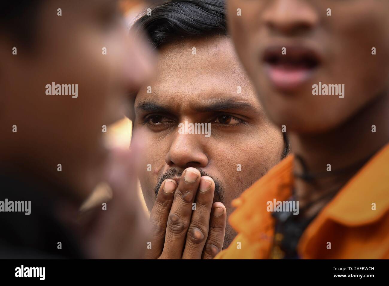 New Delhi, India. 8th Dec, 2019. Relatives of victims of a fire incident wait outside a mortuary in New Delhi, India, Dec. 8, 2019. At least 43 people died and more than 50 injured in the fire incident. The injured are undergoing medical treatment at four different hospitals. The fire broke out in north Delhi's Filmistan area in the early hours of Sunday when more than 100 people, mostly labourers, were asleep inside a four-storey building. Credit: Str/Xinhua/Alamy Live News Stock Photo